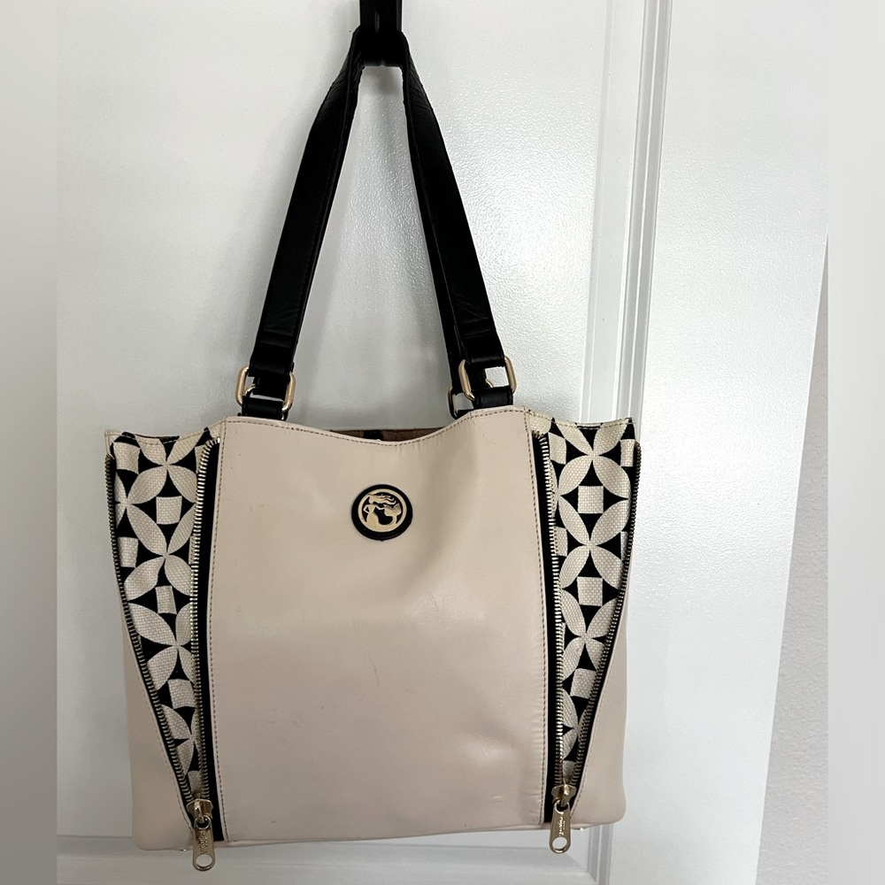 Spartina expanding tote, cream leather, gold hardware.